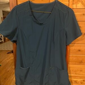 Cherokee women’s scrub top. Size large, still plenty of life left!